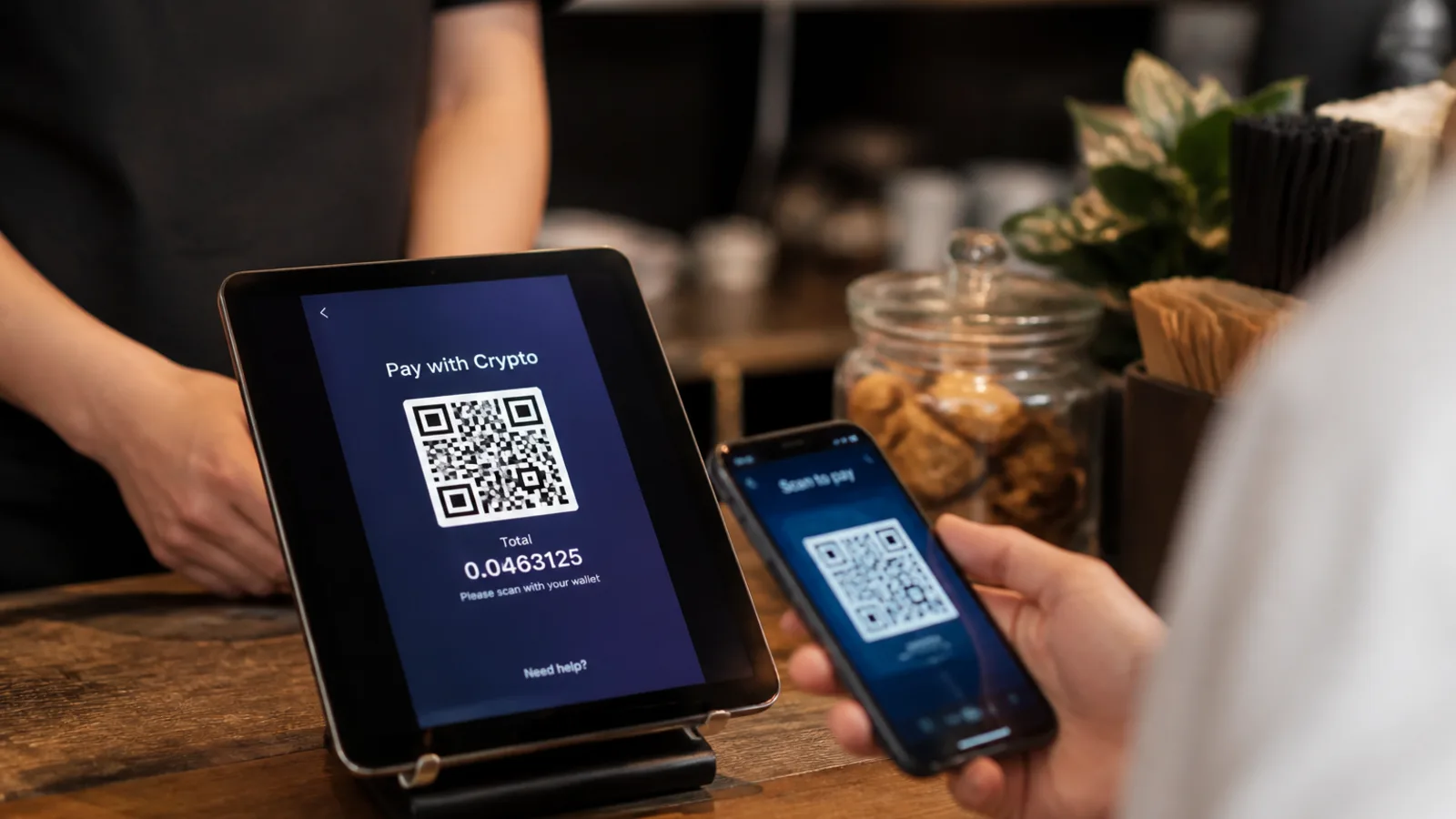 Customer paying by phone QR at a shop counter